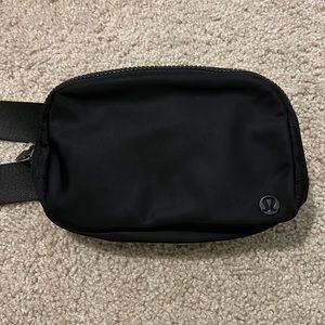 Original (non extended strap) lululemon belt bag in black (USED)
